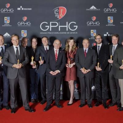Winners of the Grand Prix d’Horlogerie de Genève 2013 : Carlo Lamprecht, Président of the GPHG, Richard and Maria Kristina Habring (CEO of Habring2), Wilhelm Schmid (CEO of A. Lange & Söhne), Jean-Frédéric Dufour (CEO of Zenith), Michele Sofisti (CEO of Girard-Perregaux), Vianney Halter (Founder), Philippe Peverelli (CEO of Tudor), Ueli Maurer, Président of the Swiss Confederation, Brigitte Morina (CEO of DeLaneau), Karl-Friederich Scheufele (Co-Président of Chopard), Nicolas Bos (CEO of Van Cleef & Arpels), Benoît Mintiens (Founder of Ressence), Kari Voutilainen (Founder of Voutilainen), Philippe Dufour, Nicolas Beau (International Director of Horlogerie at Chanel), Romain Gauthier (Founder)