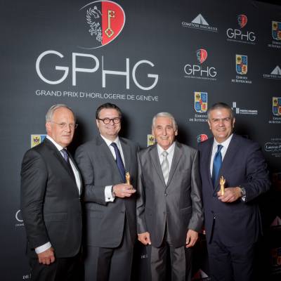 Johann Schneider-Ammann (Federal councillor), Aldo Magada (President & CEO of Zenith, winner of the Sports Watch Prize 2014), Carlo Lamprecht (President of the Foundation of the GPHG) and Ricardo Guadalupe (CEO of Hublot, winner of the Striking Watch Prize 2014)